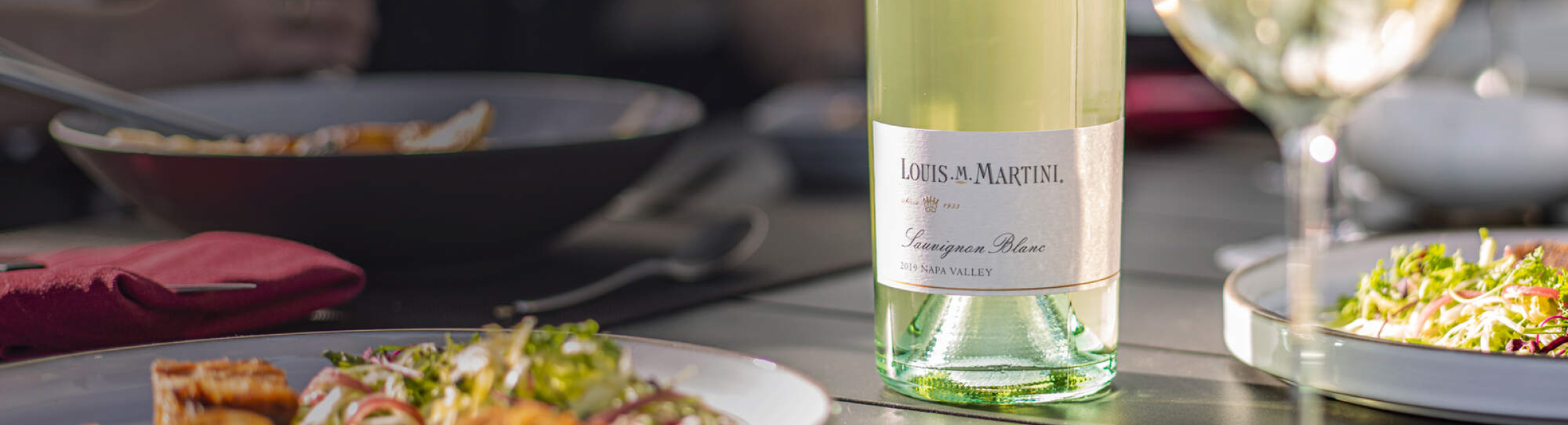 2019 Louis M. Martini Sauvignon Blanc bottle with food.