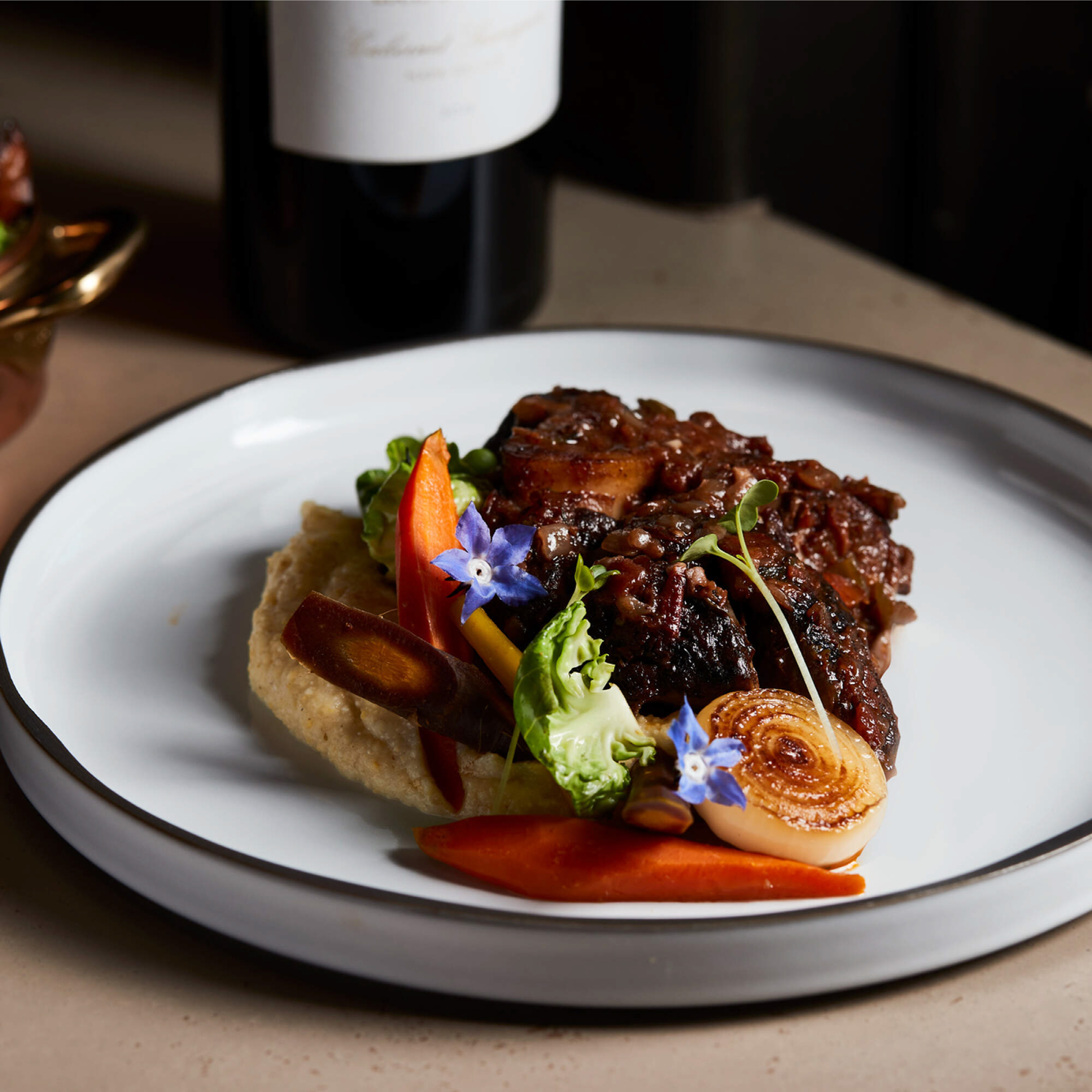 Veal Osso Bucco with Toasted Garlic Gremolata.