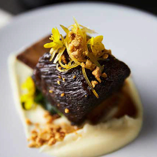 Short Rib Pastrami with Parsnip Puree, Wilted Arugula and Curried Almond