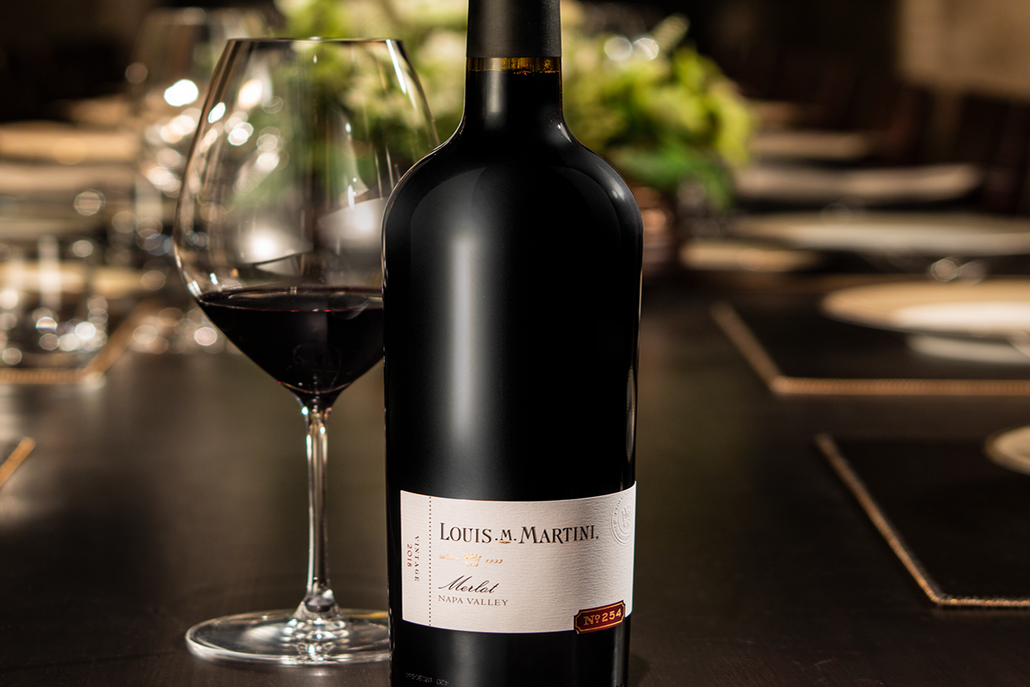 Louis M. Martini Merlot bottle and wine glass