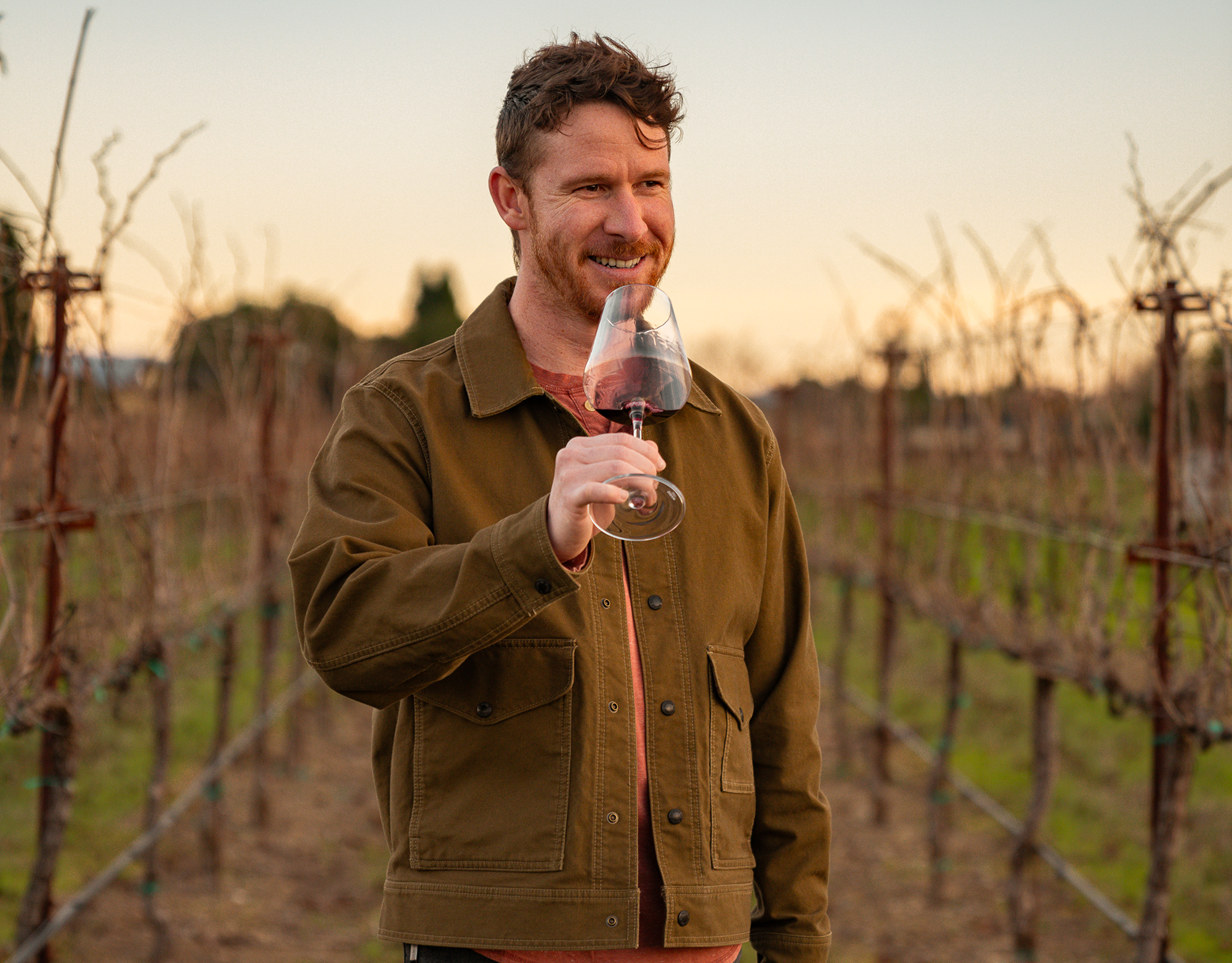 Zach Watkins harvesting grapes