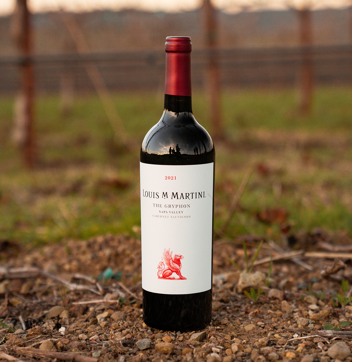 bottle of 2021 the gryphon in vineyard