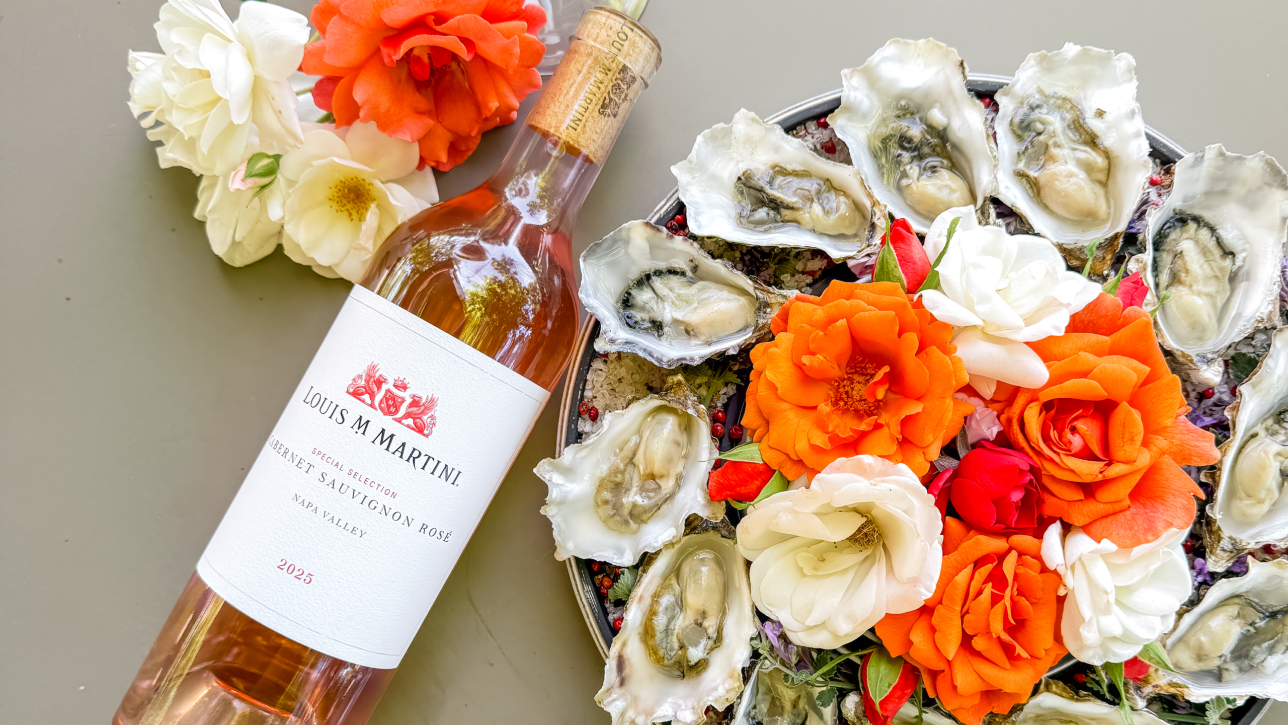 Rosé, roses, and oysters