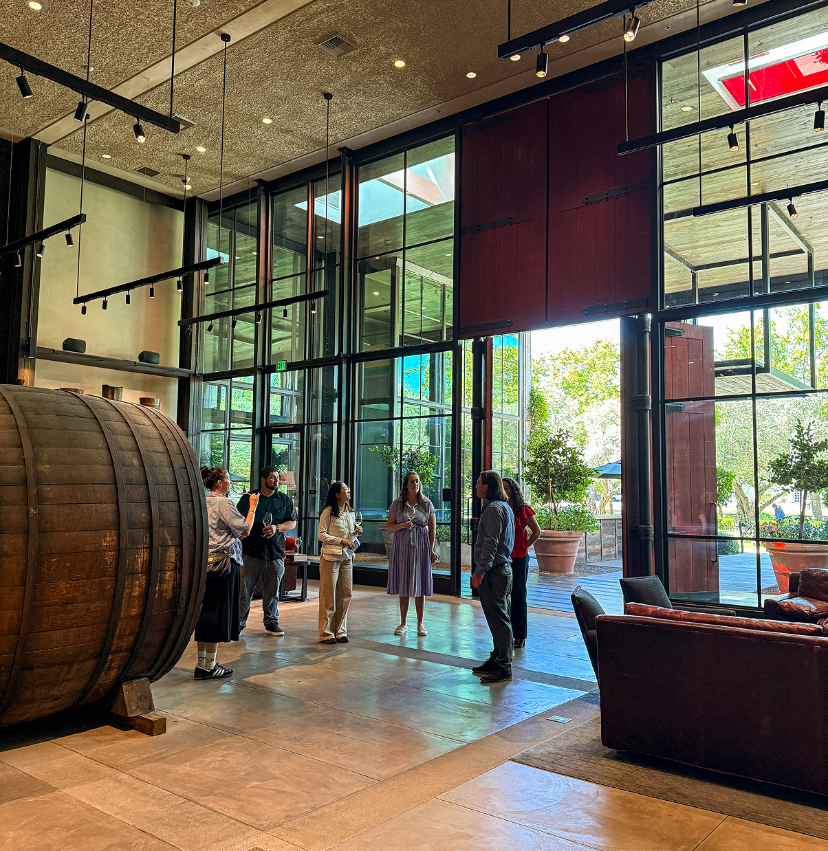 people gathering at entrance of louis martini winery tasting room