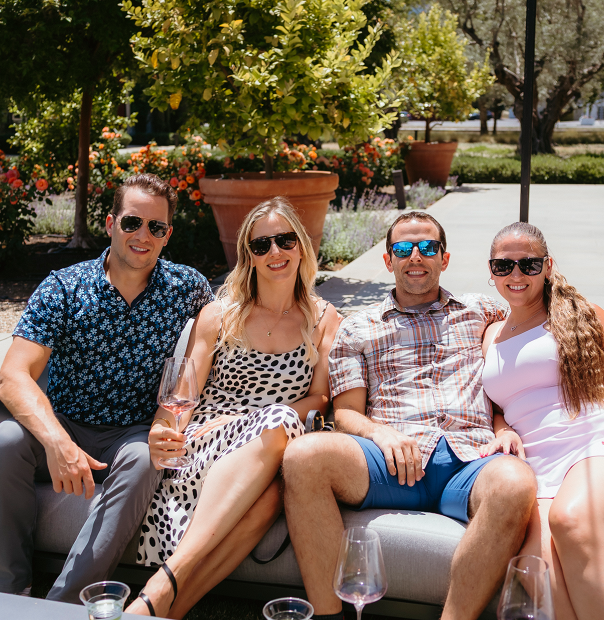 people sitting on couch outside at louis m. martini winery